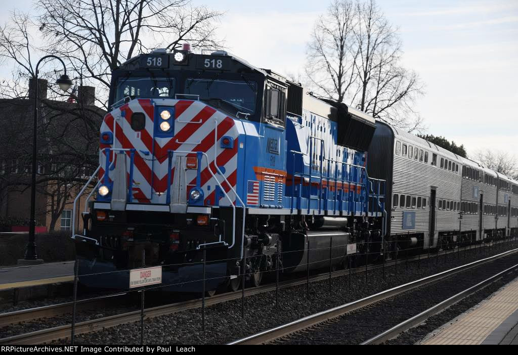 Outbound commuter comes into the station